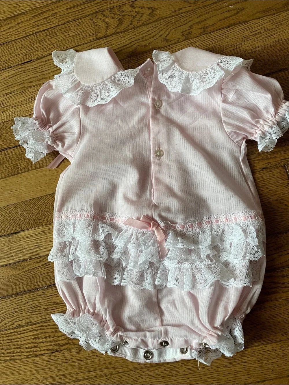 Pink Lace Bubble Romper with Satin Bow Detail
